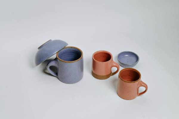 image of stoneware mugs, a bowl, and a small sauce bowl that safe for hot noodle soup, cold orange juice, and will not cause chronic melamine exposure from melamine resin You can serve food without worrying about levels of melamine with these non-toxic options