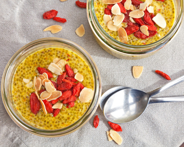 Start Your Day the Right (and Seasonal) Way with this Pumpkin Chia Seed Pudding Recipe. Image of chia seed pudding with gogi berries and sliced almonds