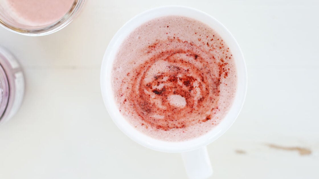 pretty pink beetroot latte in a white cup