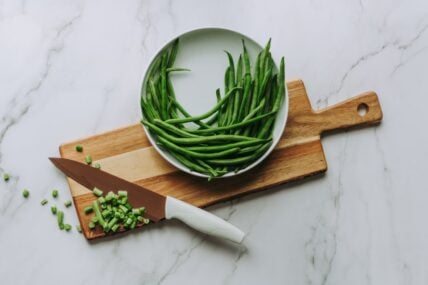 French Green beans on cutting board for sauteed green bean recipe