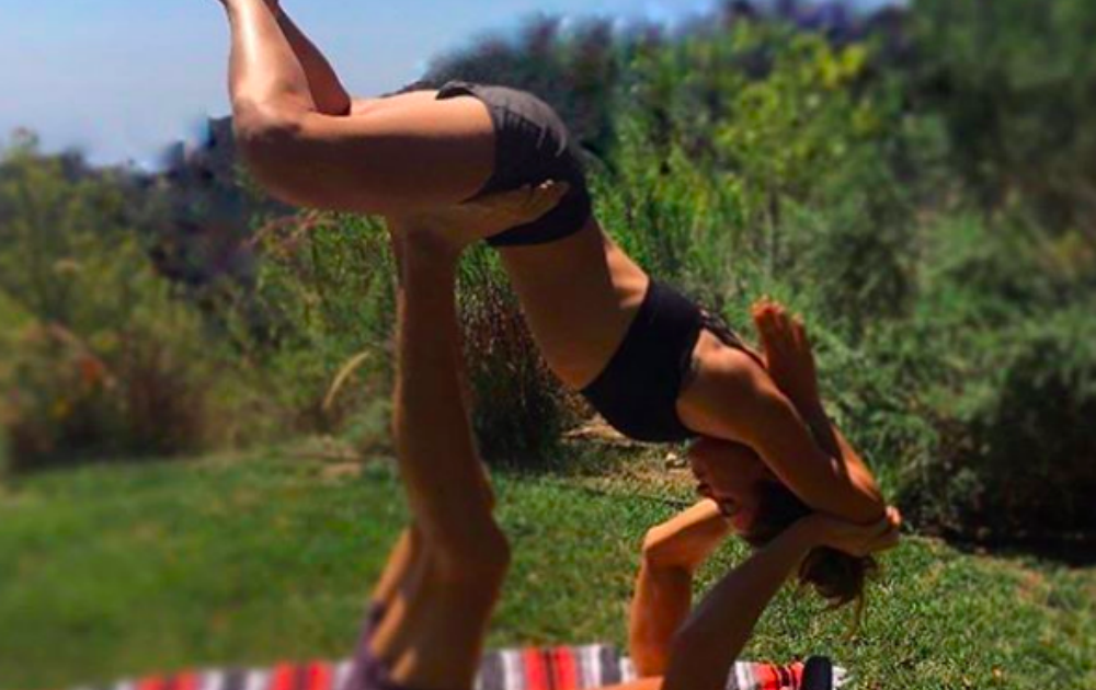 Nikki Reed's All About Acro Yoga But Should You Try It?