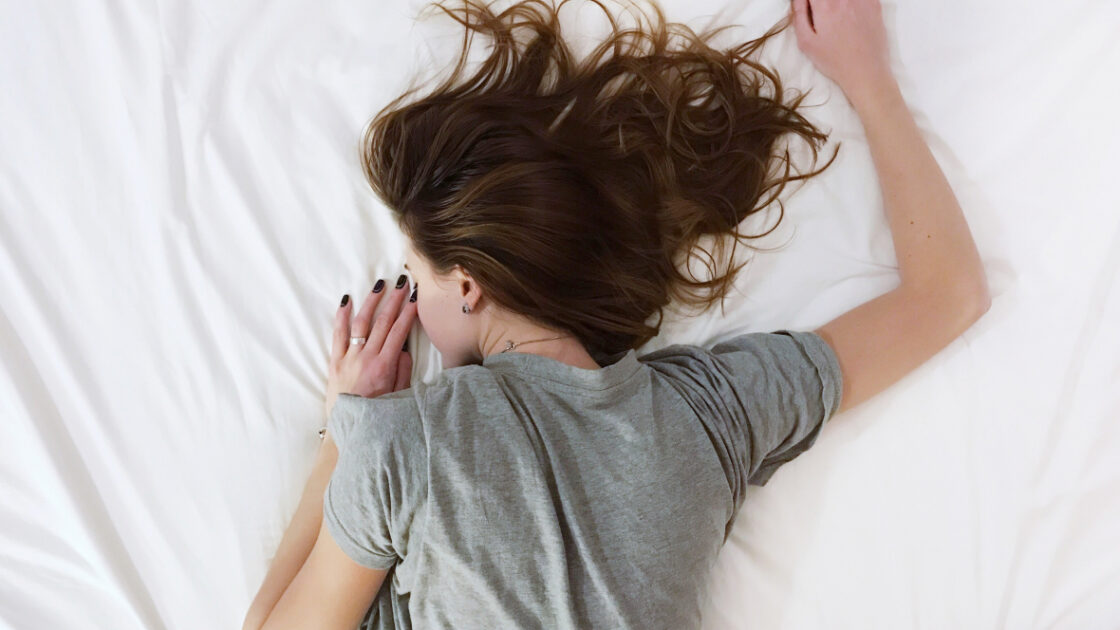 woman sleeping in bed