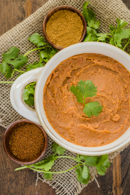 Vegan Homemade Refried Beans Recipe with Chiles, Onions, and Spices. So tasty and tastes like restaurant quality!