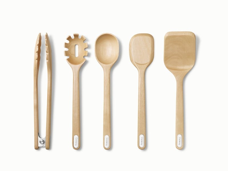 Image of a five-piece set of birch wood Caraway utensils laid out flat against a white background.